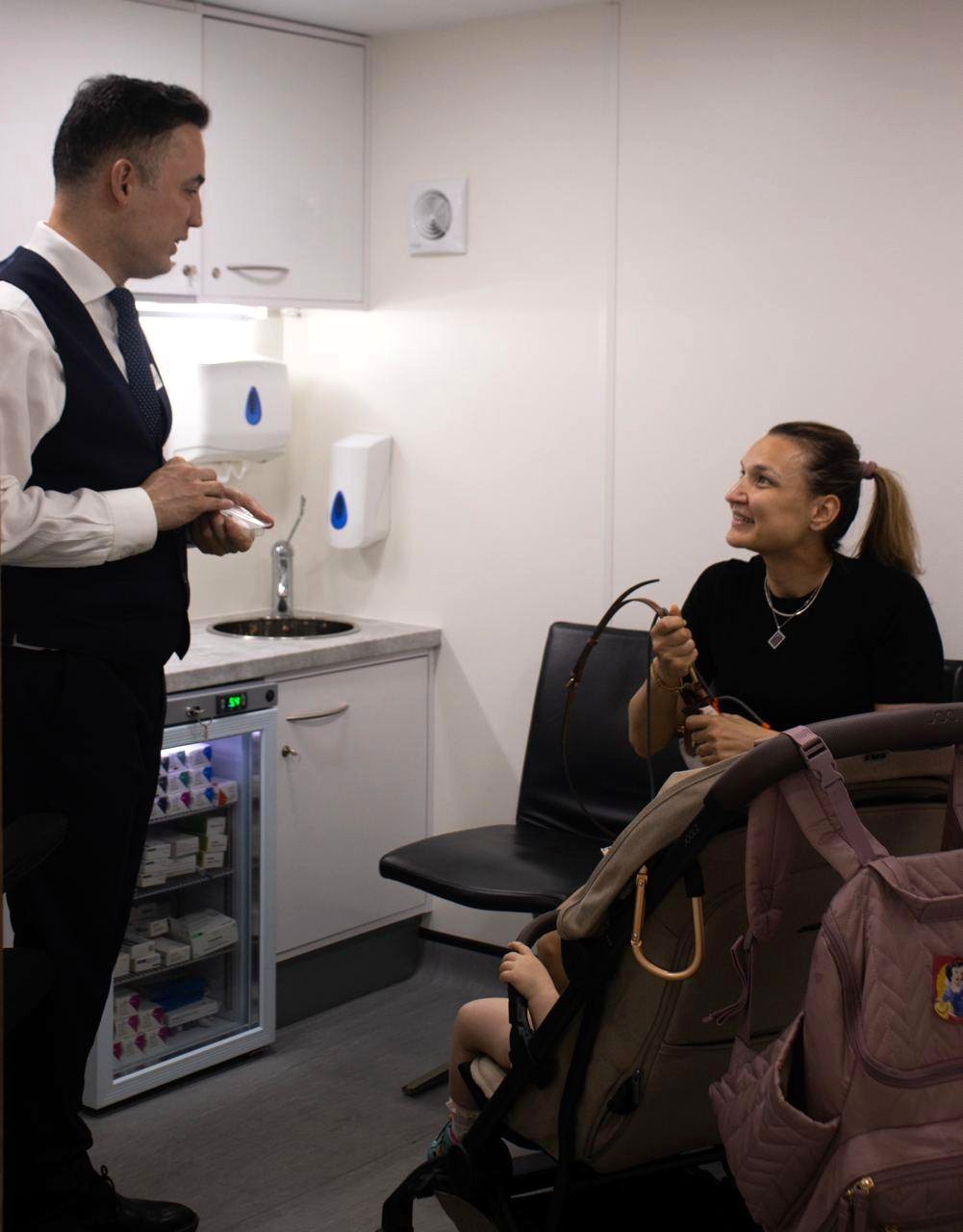 Family receiving travel advice at Hampstead Clinic